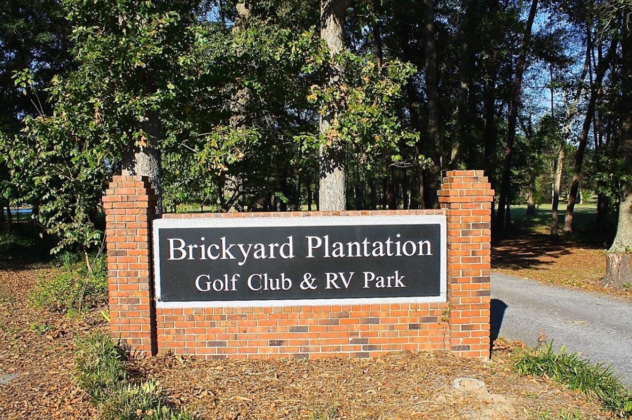The brick entrance sign for Brickyard Plantation Golf Club & RV Park.